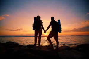 Hikers at sunset